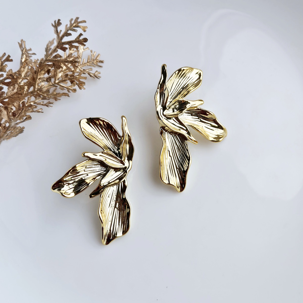 Tekstūriniai auskarai