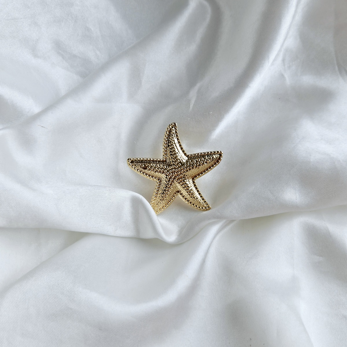 Masyvus jūros žvaigždės žiedas