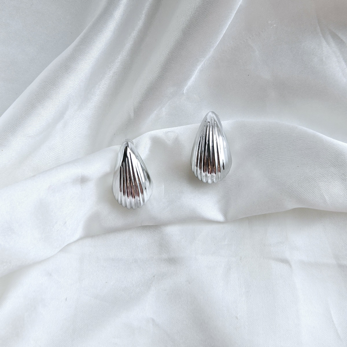 Braukyti sidabro spalvos lašai